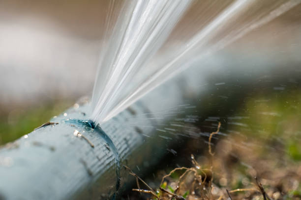 water leaking from hole in a agriculture hose